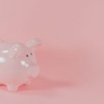 A predictable revenue B2B strategy involving a pink piggy bank